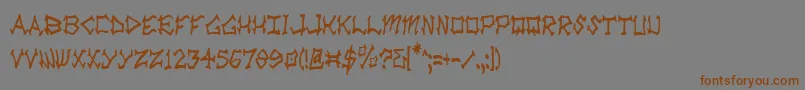 フォントRadZadCondensed – 茶色の文字が灰色の背景にあります。