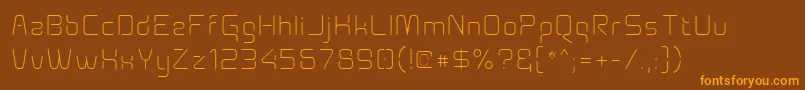 Aunchanted Xspace Thin Font – Orange Fonts on Brown Background