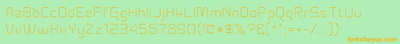 フォントAunchanted Xspace Thin – オレンジの文字が緑の背景にあります。