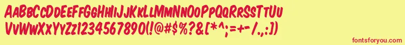 KomikaTitleKaps Font – Red Fonts on Yellow Background