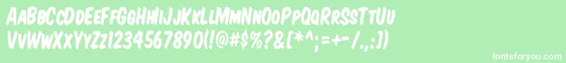 フォントKomikaTitleKaps – 緑の背景に白い文字