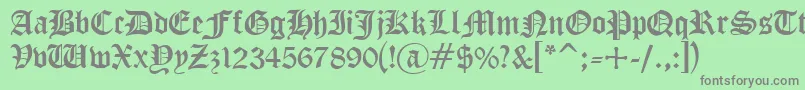 フォントCyrillic ffy – 緑の背景に灰色の文字