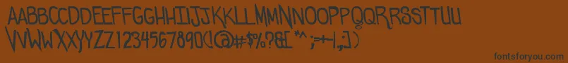 Comicdouche Font – Black Fonts on Brown Background
