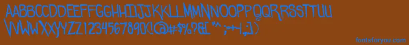 Comicdouche Font – Blue Fonts on Brown Background