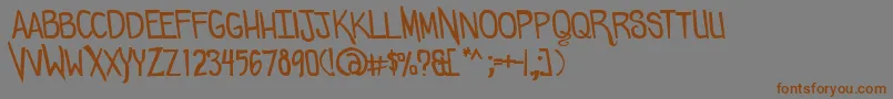 Comicdouche Font – Brown Fonts on Gray Background