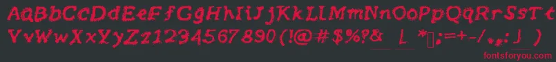 フォントBrushy – 黒い背景に赤い文字