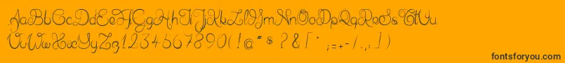 フォントDelphineetmathiasscript – 黒い文字のオレンジの背景