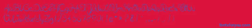 Шрифт Delphineetmathiasscript – синие шрифты на красном фоне