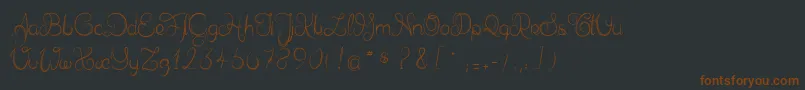 Delphineetmathiasscript-Schriftart – Braune Schriften auf schwarzem Hintergrund