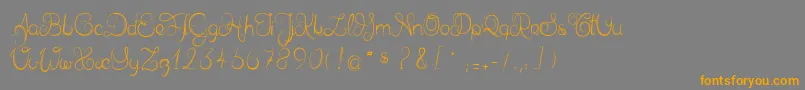 Delphineetmathiasscript-Schriftart – Orangefarbene Schriften auf grauem Hintergrund