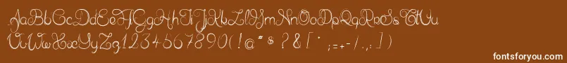 フォントDelphineetmathiasscript – 茶色の背景に白い文字