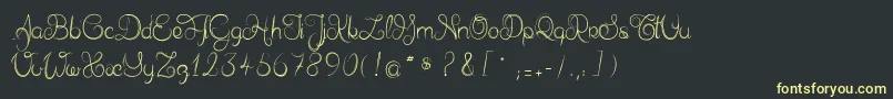 Delphineetmathiasscript Font – Yellow Fonts on Black Background