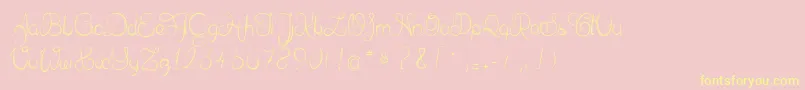フォントDelphineetmathiasscript – 黄色のフォント、ピンクの背景