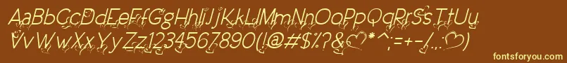 DreamLoveValentineLightItalic-fontti – keltaiset fontit ruskealla taustalla