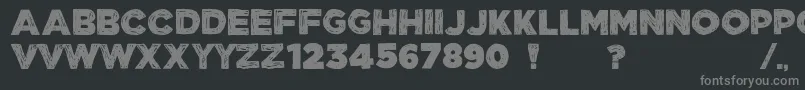 ManhattanHandBoldAllCaps-fontti – harmaat kirjasimet mustalla taustalla