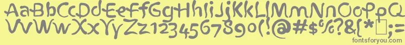 フォントAtlantius – 黄色の背景に灰色の文字