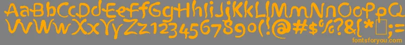 フォントAtlantius – オレンジの文字は灰色の背景にあります。