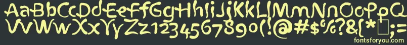 フォントAtlantius – 黒い背景に黄色の文字