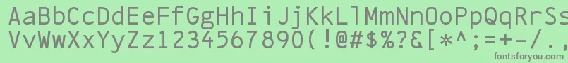 フォントLinefeedRegular – 緑の背景に灰色の文字