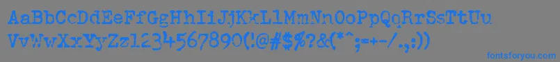 フォントPfdumboldtypetwo – 灰色の背景に青い文字