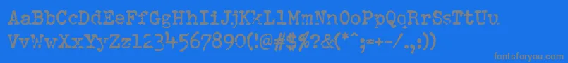 Pfdumboldtypetwo-Schriftart – Graue Schriften auf blauem Hintergrund
