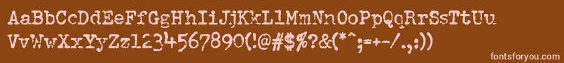 Fonte Pfdumboldtypetwo – fontes rosa em um fundo marrom