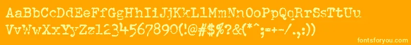 Pfdumboldtypetwo-fontti – keltaiset fontit oranssilla taustalla