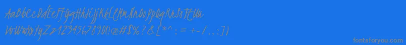 フォントKristi – 青い背景に灰色の文字