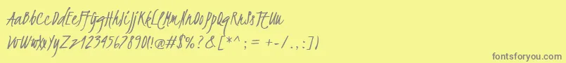 フォントKristi – 黄色の背景に灰色の文字