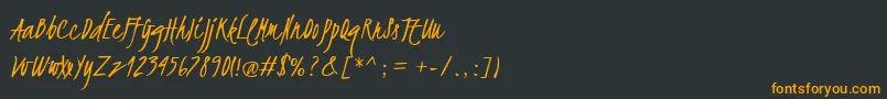 フォントKristi – 黒い背景にオレンジの文字