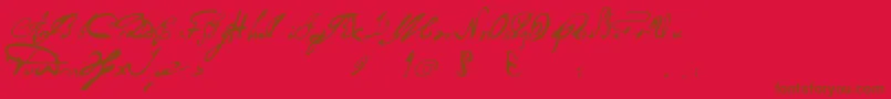 フォントPortuguesarcaicolectura – 赤い背景に茶色の文字