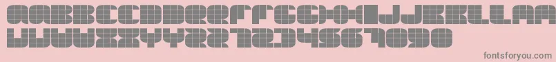 Thesumme-fontti – harmaat kirjasimet vaaleanpunaisella taustalla