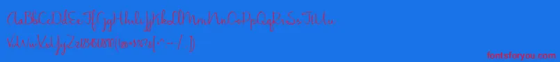 Czcionka JasmineReminiscentse – czerwone czcionki na niebieskim tle