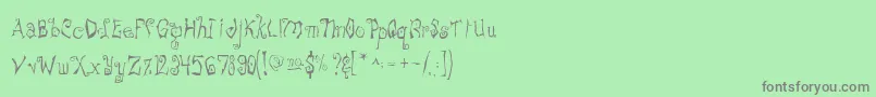 Подробнее о шрифте Freakshowscarya Шрифт Freakshowscarya – серые шрифты на зелёном фоне