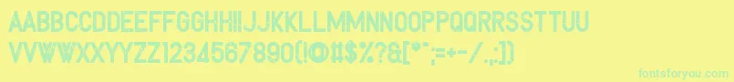 Toreadore Font – Green Fonts on Yellow Background