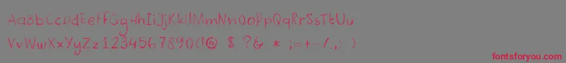 DkCrayonista-Schriftart – Rote Schriften auf grauem Hintergrund