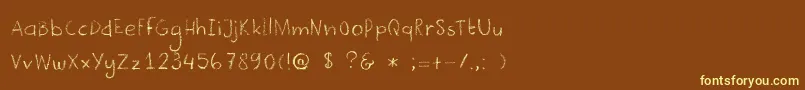 DkCrayonista-fontti – keltaiset fontit ruskealla taustalla