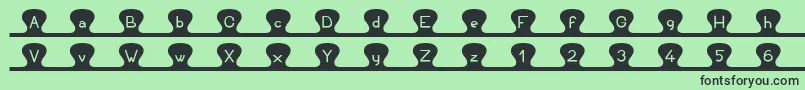Unzipme Font – Black Fonts on Green Background