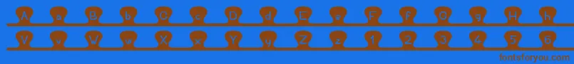 Unzipme Font – Brown Fonts on Blue Background