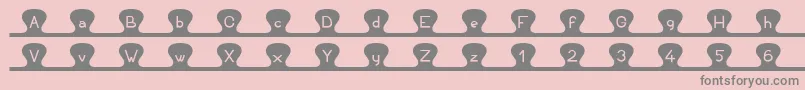 Unzipme Font – Gray Fonts on Pink Background