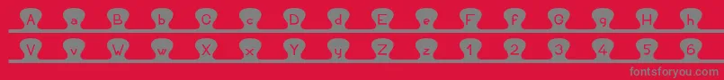 Unzipme Font – Gray Fonts on Red Background