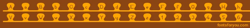 Unzipme Font – Orange Fonts on Brown Background