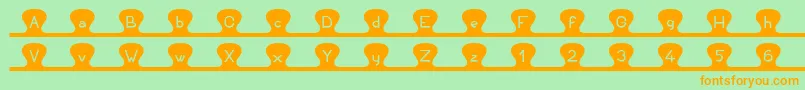 Unzipme Font – Orange Fonts on Green Background