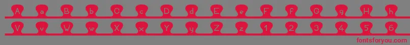 Unzipme Font – Red Fonts on Gray Background