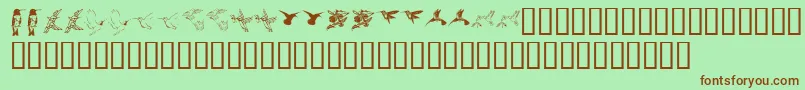 フォントKr Renees Hummingbirds Two – 緑の背景に茶色のフォント