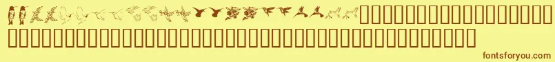 フォントKr Renees Hummingbirds Two – 茶色の文字が黄色の背景にあります。