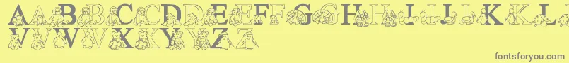LmsTyBabies-fontti – harmaat kirjasimet keltaisella taustalla