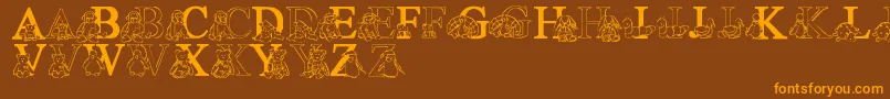 フォントLmsTyBabies – オレンジ色の文字が茶色の背景にあります。