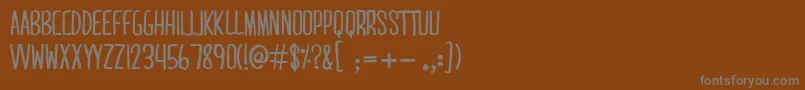 フォントMaridavid – 茶色の背景に灰色の文字