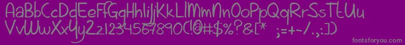 Aintnothingfancy-fontti – harmaat kirjasimet violetilla taustalla